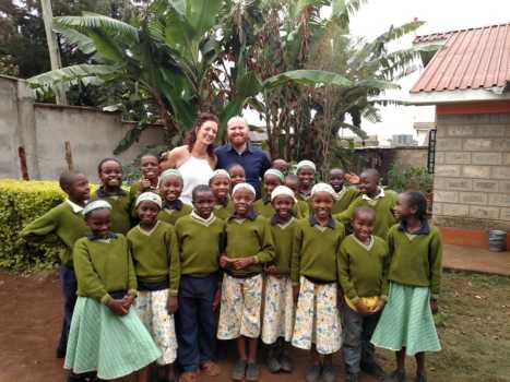 Christi and her husband Joe, who she married in May of this year, with Classes 4 and 5. 
