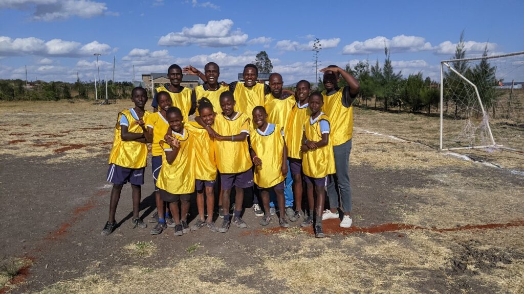 Updates from Kenya, students and staff play football

